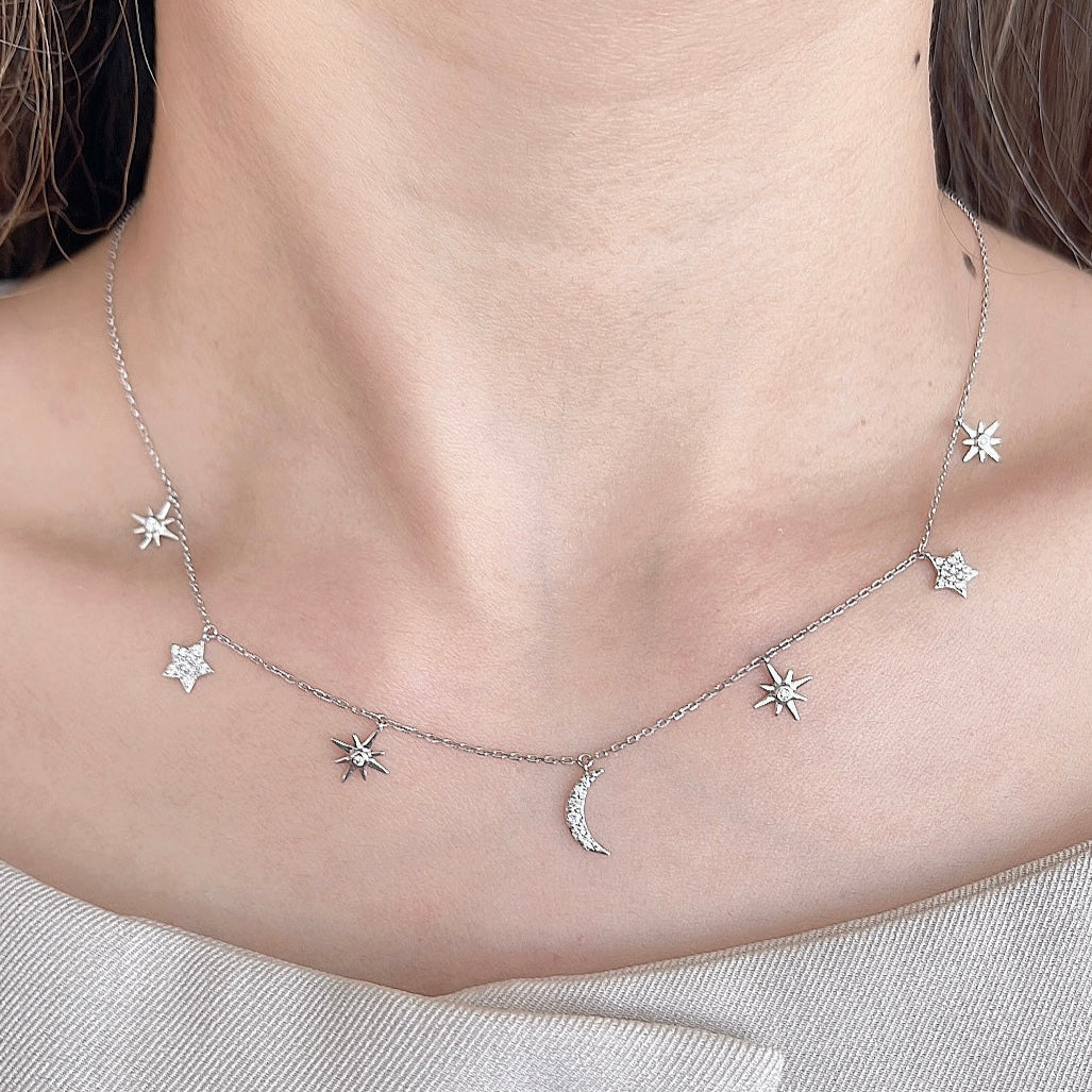 Wilderness Dangling Star And Moon Necklace