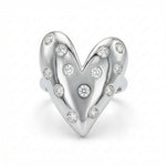 Load image into Gallery viewer, Silver heart-shaped charm with embedded diamonds on a white background