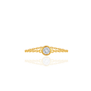 Gold ring with a diamond on a white background