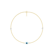 Gold necklace with a blue evil eye pendant on a white background