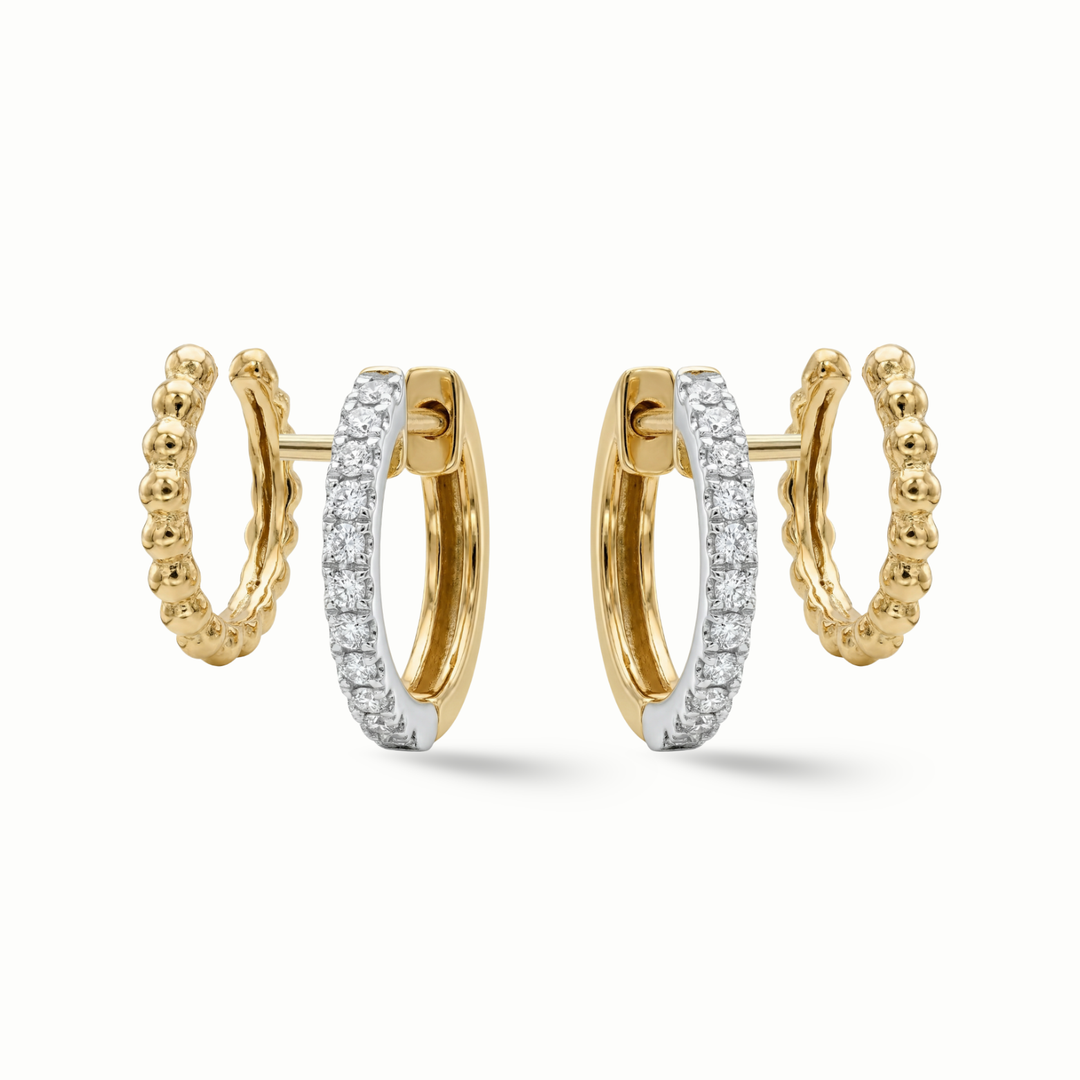 Diamond huggie hoop earrings 18K gold women Dubai
