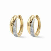Pavé diamond huggie earrings 18K gold women Dubai UAE
