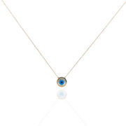 Necklace with a small round pendant featuring an eye design on a white background