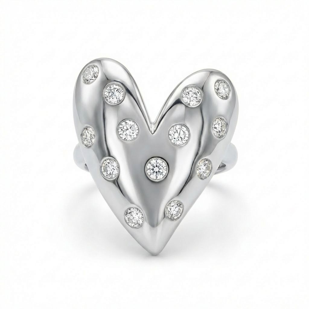 Silver heart-shaped charm with embedded diamonds on a white background